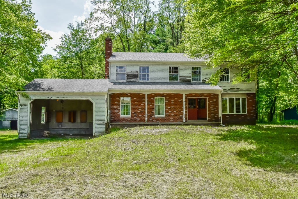 5201 Rootstown Road Ravenna, OH 44266 - Photo 1 of 18 Handyman special! 5 bedroom, 2.5 bath colonial on 3 acres seconds from Lake Hodgson!