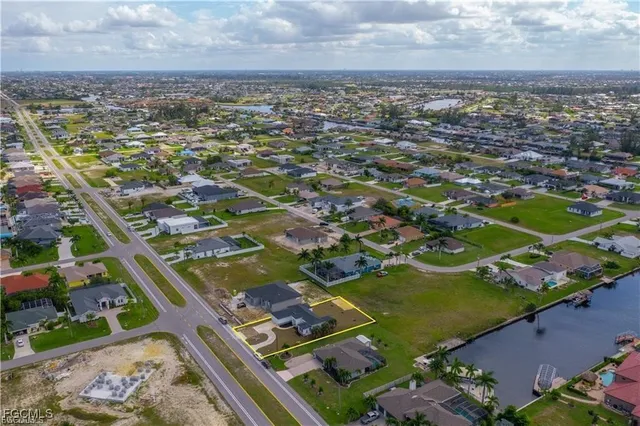 an aerial view of a house with a garden