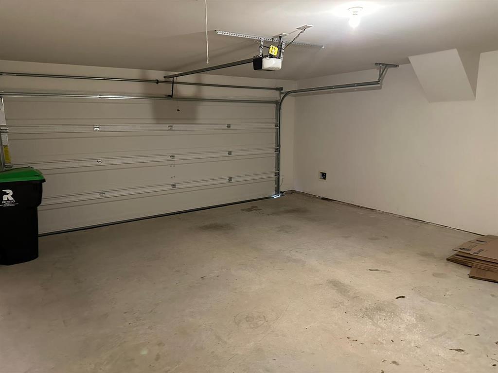 13624 Mineral Road Ponder, TX 76259 - Photo 24 of 26 Garage with a garage door opener
