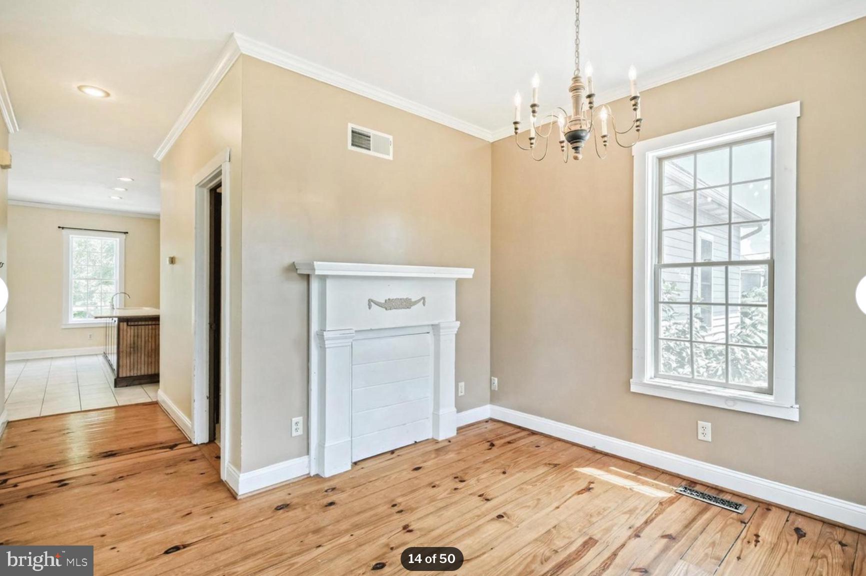 1520 Herrs Ridge Road Gettysburg, PA 17325 - Photo 14 of 51 a view of a bedroom with wooden floor and a window