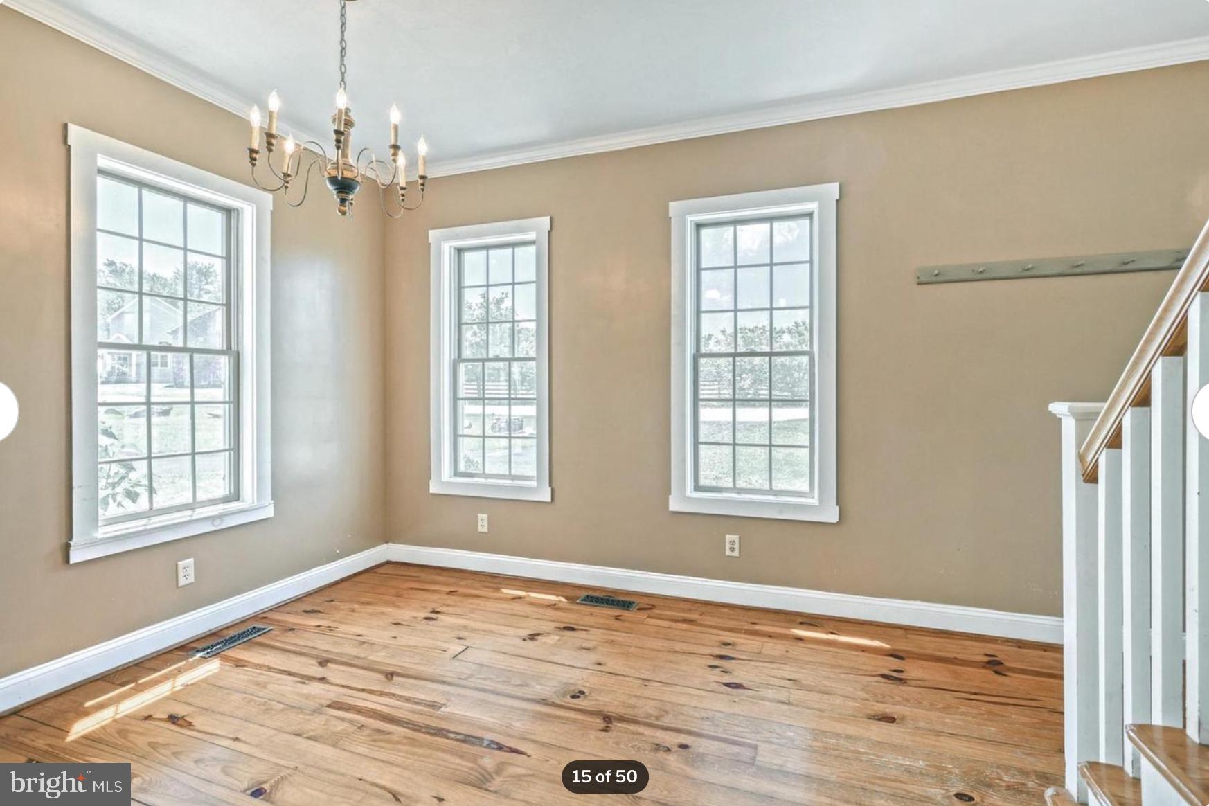 1520 Herrs Ridge Road Gettysburg, PA 17325 - Photo 15 of 51 a view of an empty room with wooden floor and window