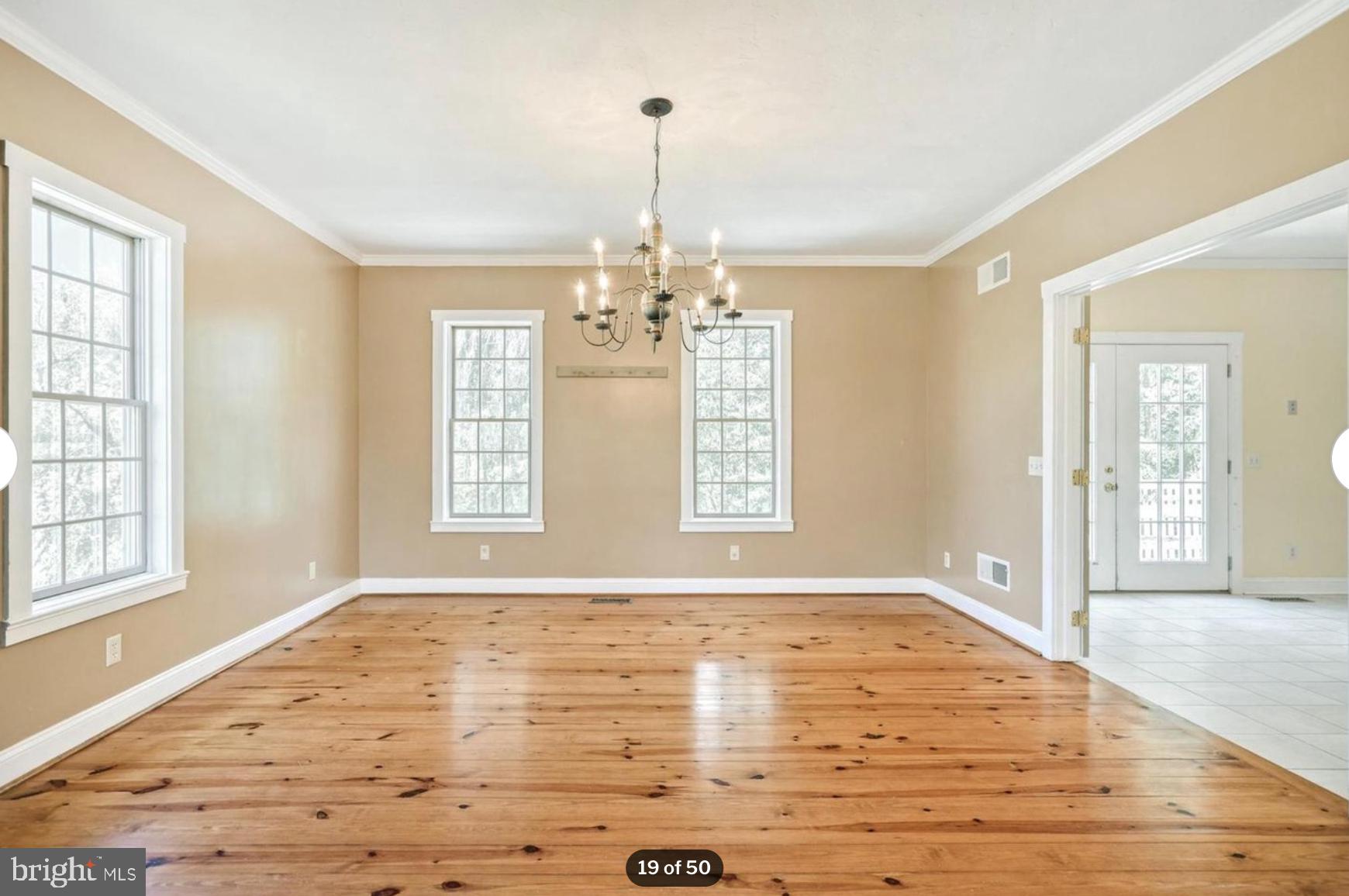 1520 Herrs Ridge Road Gettysburg, PA 17325 - Photo 19 of 51 a view of an empty room with wooden floor and a window