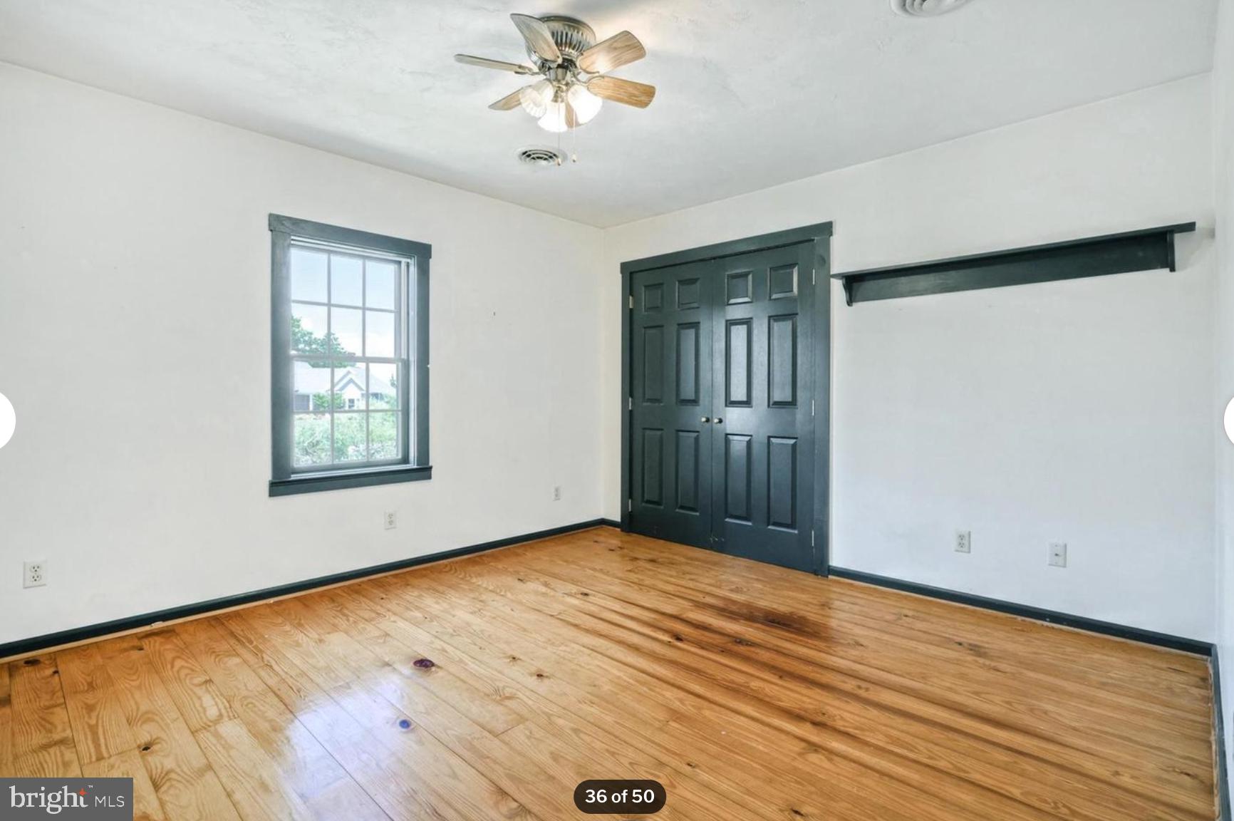 1520 Herrs Ridge Road Gettysburg, PA 17325 - Photo 37 of 51 a view of an empty room with wooden floor and a window