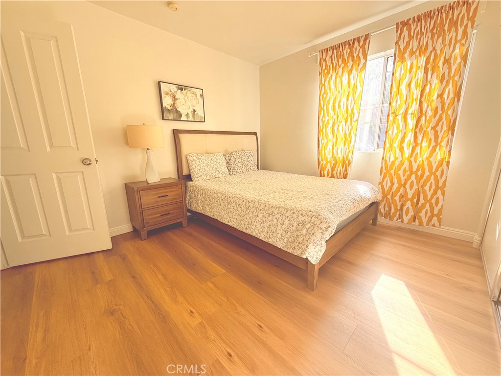 8 Marsala Irvine, CA 92606 - Photo 6 of 8 a bedroom with a bed and a window