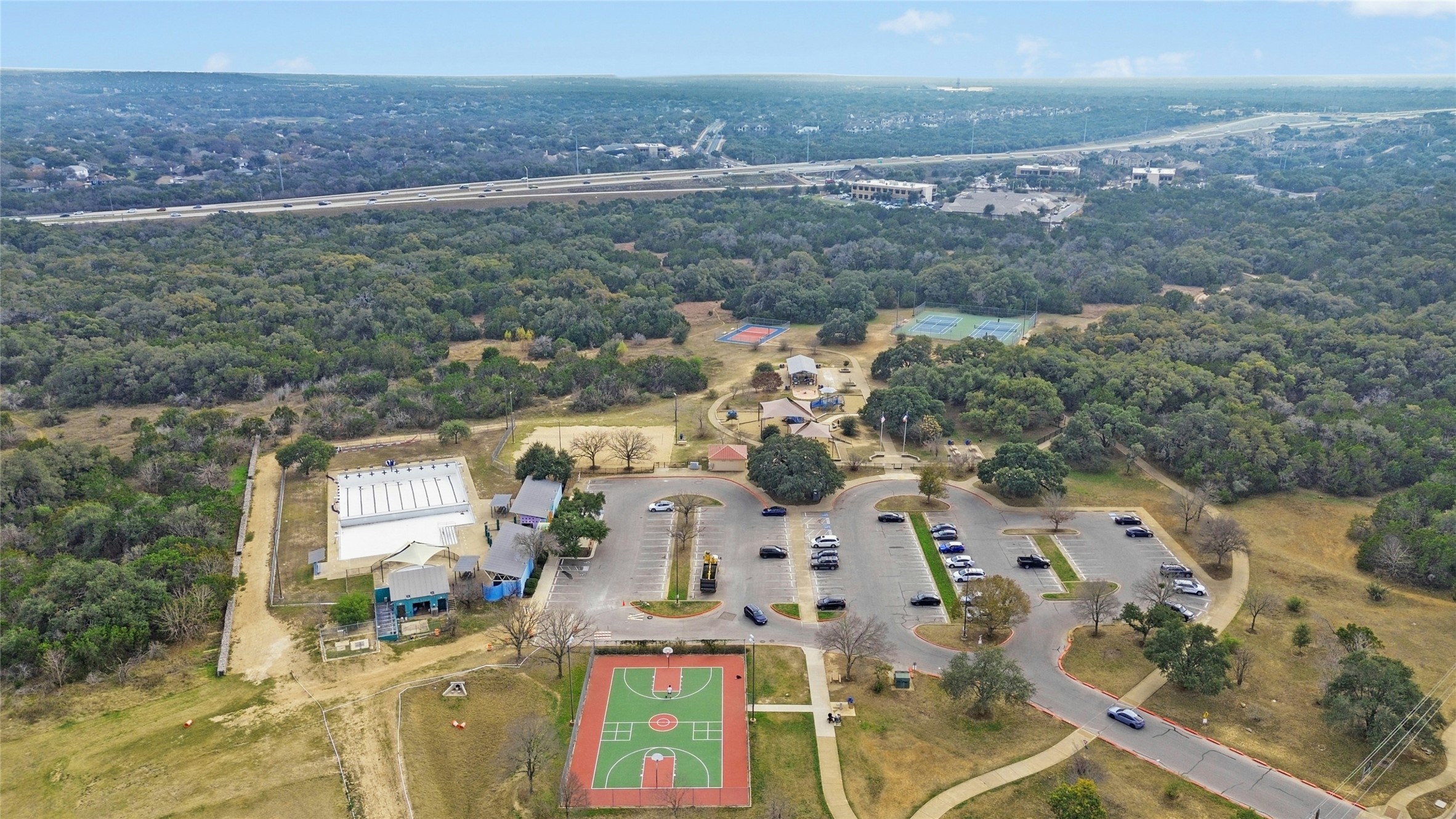 5611 Magee Bend Austin, TX 78749 - Photo 28 of 28 In walking distance to Dick Nichols Park, where you’ll enjoy miles of trails, a swimming pool, playground, and courts for soccer, basketball, volleyball, and tennis.