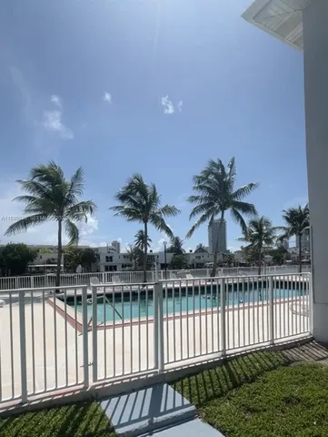 a view of a ocean view with a nearby beach