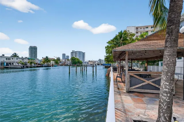 a view of swimming pool with a yard