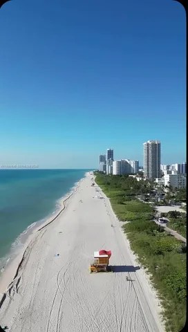 a view of a sign with a small yard