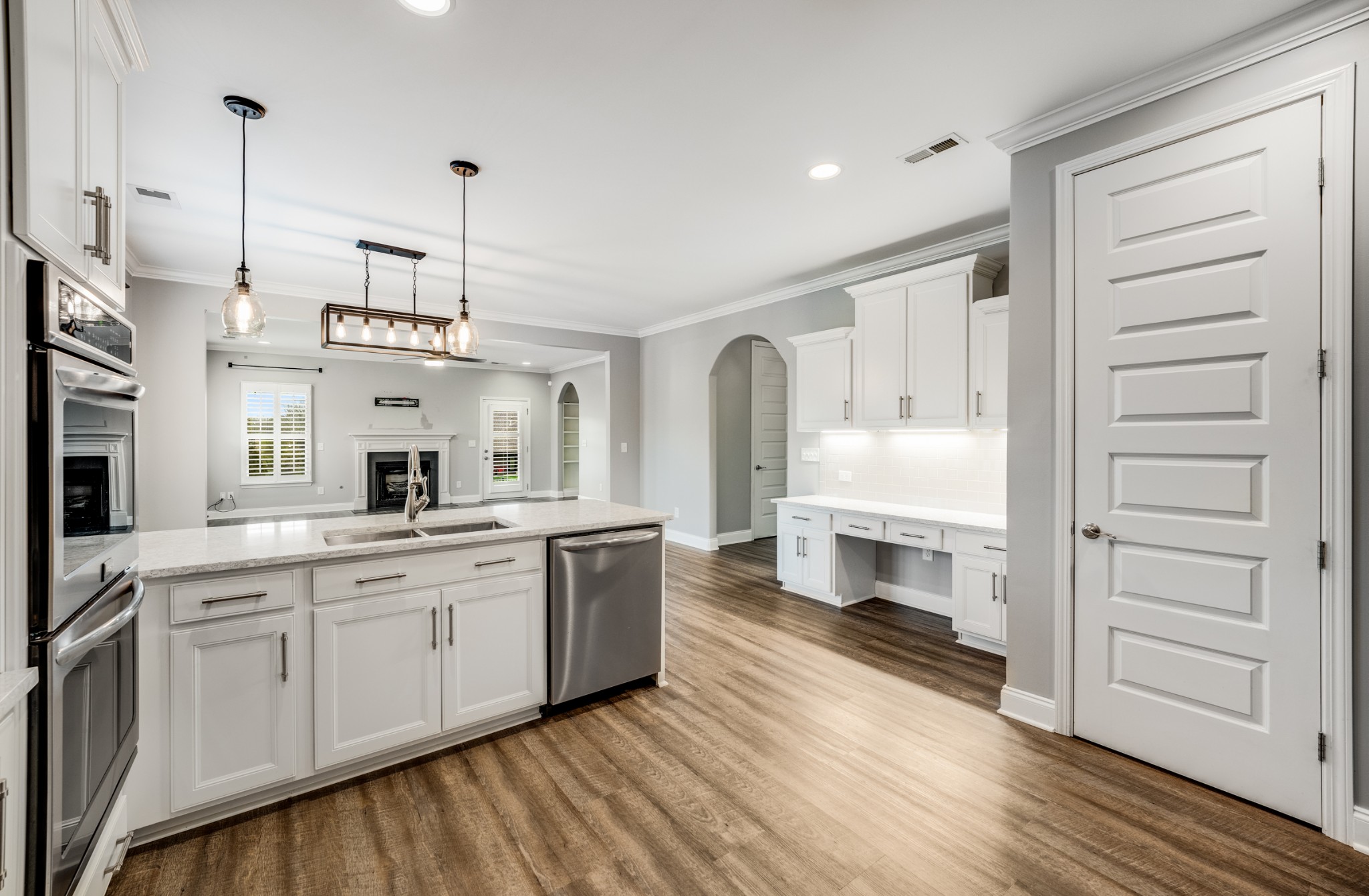 5001 Rizer Point Drive Franklin, TN 37069 - Photo 16 of 42 a large white kitchen with stainless steel appliances