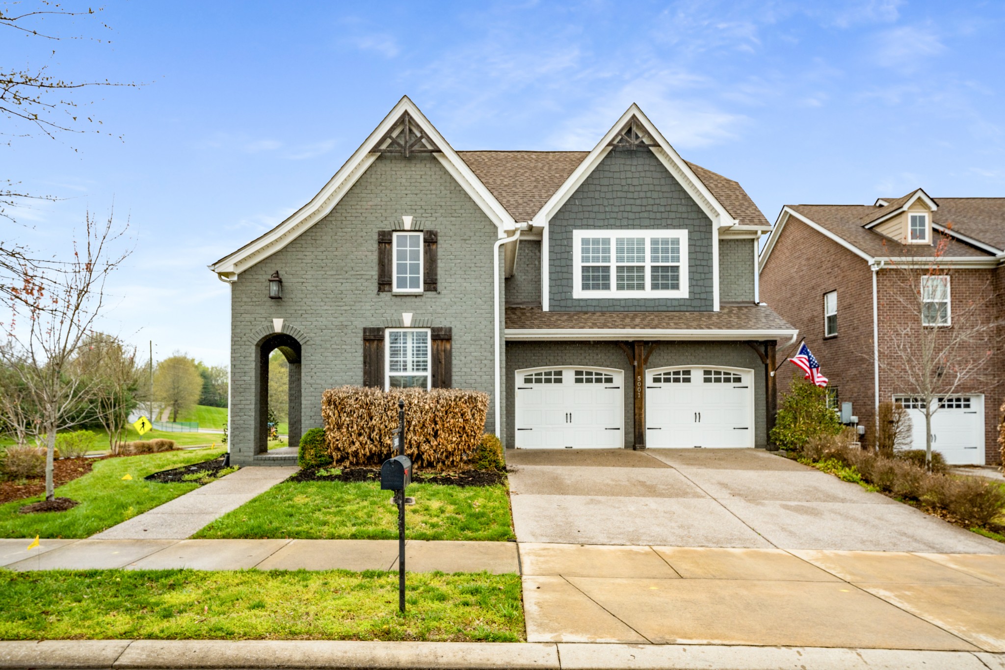 5001 Rizer Point Drive Franklin, TN 37069 - Photo 2 of 42 a front view of a house with a yard