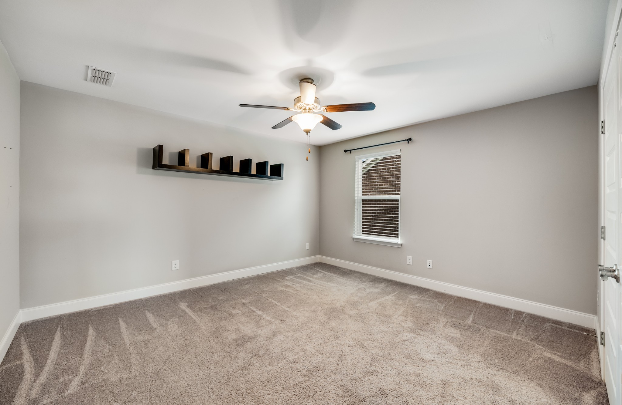 5001 Rizer Point Drive Franklin, TN 37069 - Photo 23 of 42 a view of an empty room with a window