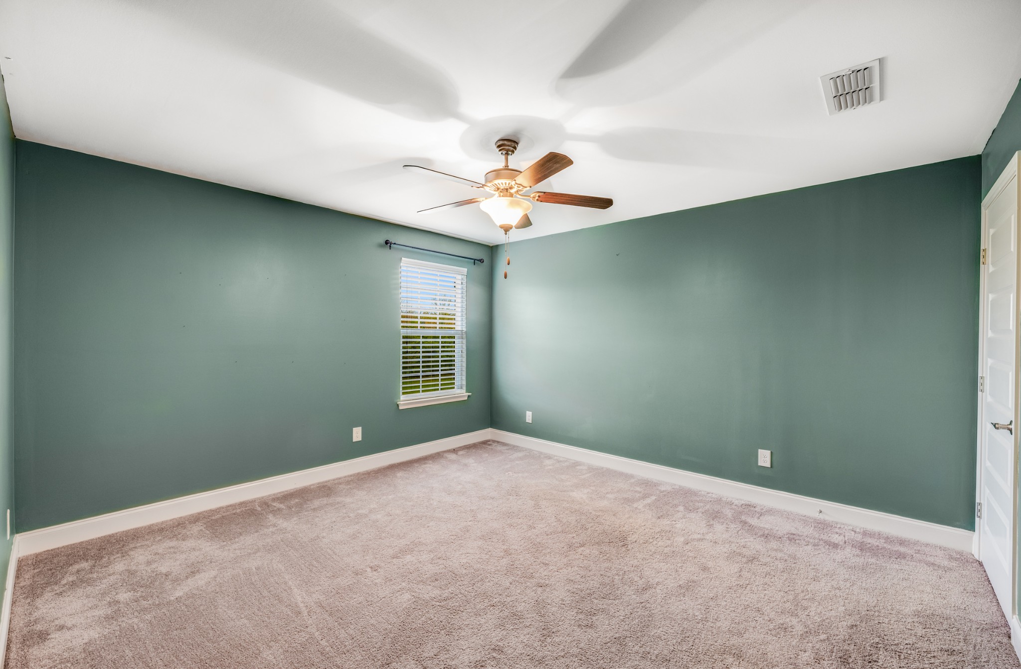5001 Rizer Point Drive Franklin, TN 37069 - Photo 26 of 42 an empty room with a window and a fan