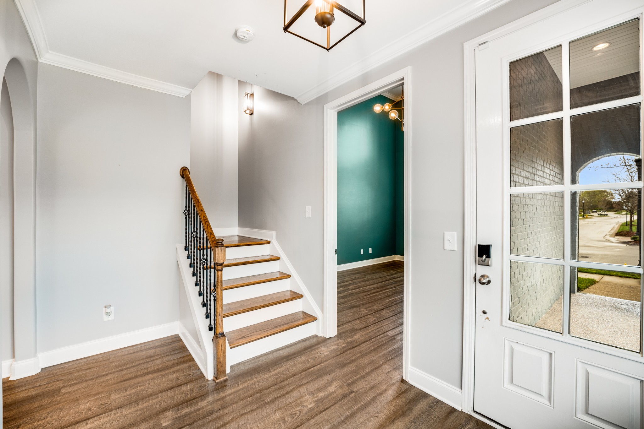 5001 Rizer Point Drive Franklin, TN 37069 - Photo 3 of 42 a view of a hallway with wooden floor and entryway