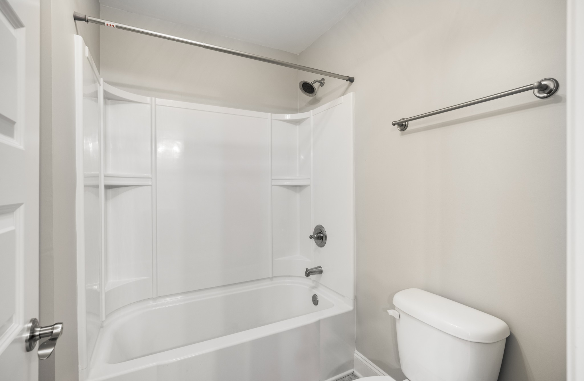 5001 Rizer Point Drive Franklin, TN 37069 - Photo 31 of 42 a bath room with a toilet and a bath tub