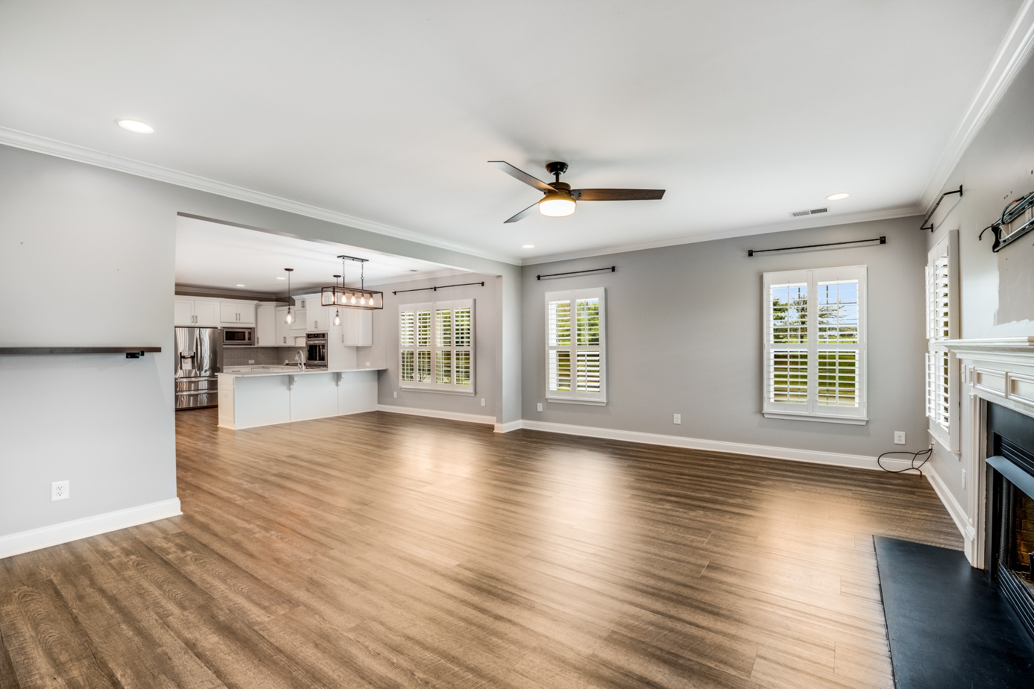 5001 Rizer Point Drive Franklin, TN 37069 - Photo 8 of 42 a view of an empty room with window and wooden floor