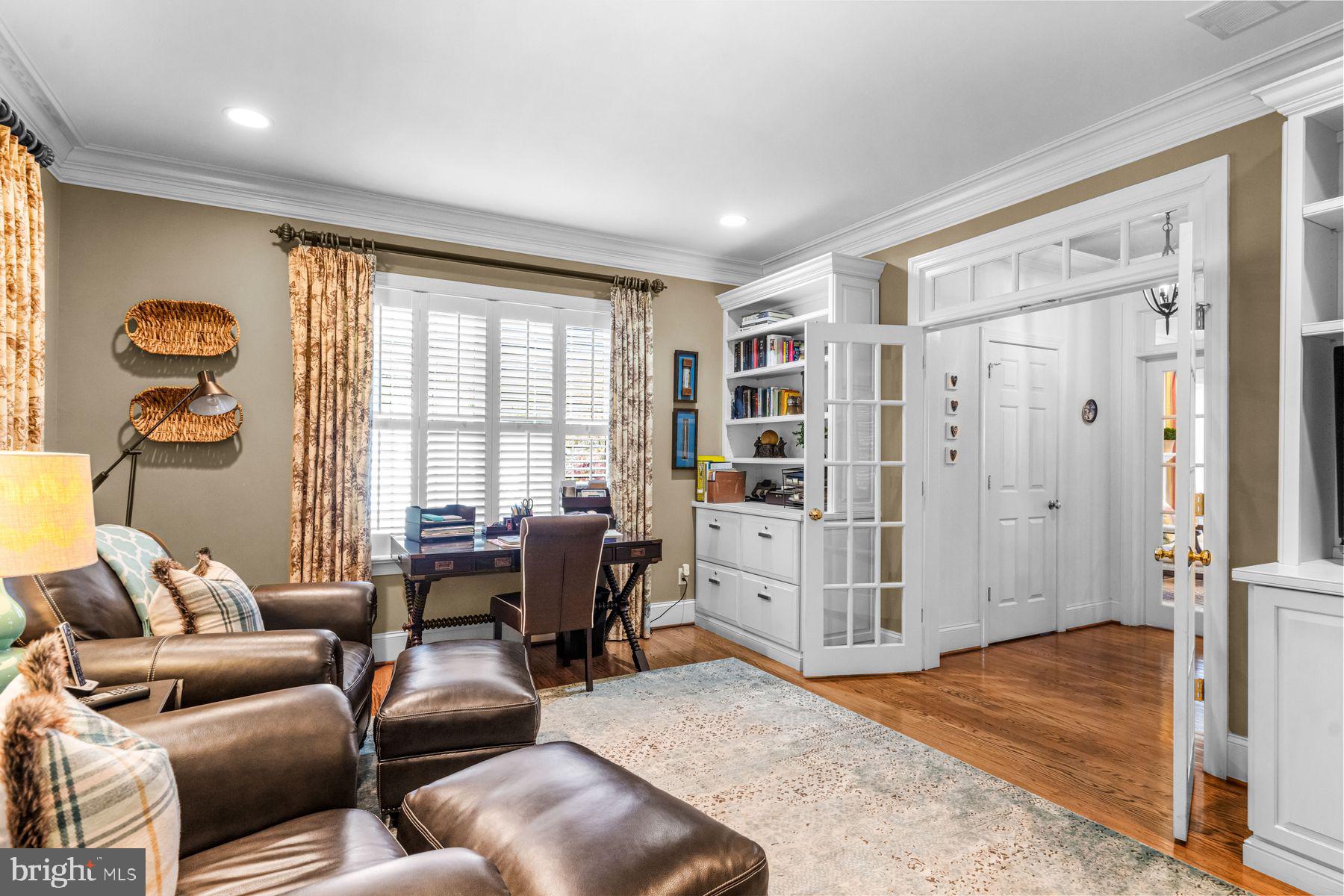 321 Exeter Road Devon, PA 19333 - Photo 18 of 79 a livingroom with workspace and a window