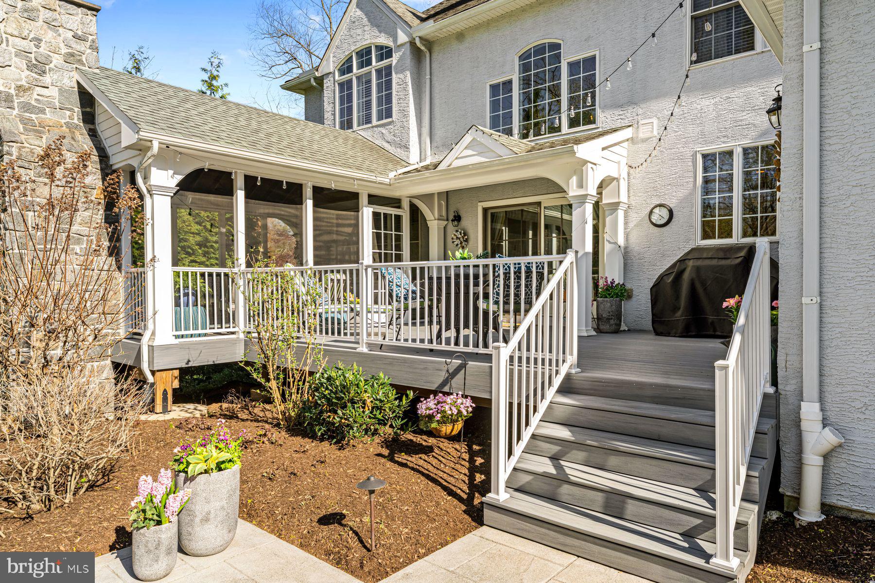 321 Exeter Road Devon, PA 19333 - Photo 34 of 79 a front view of a house with a yard