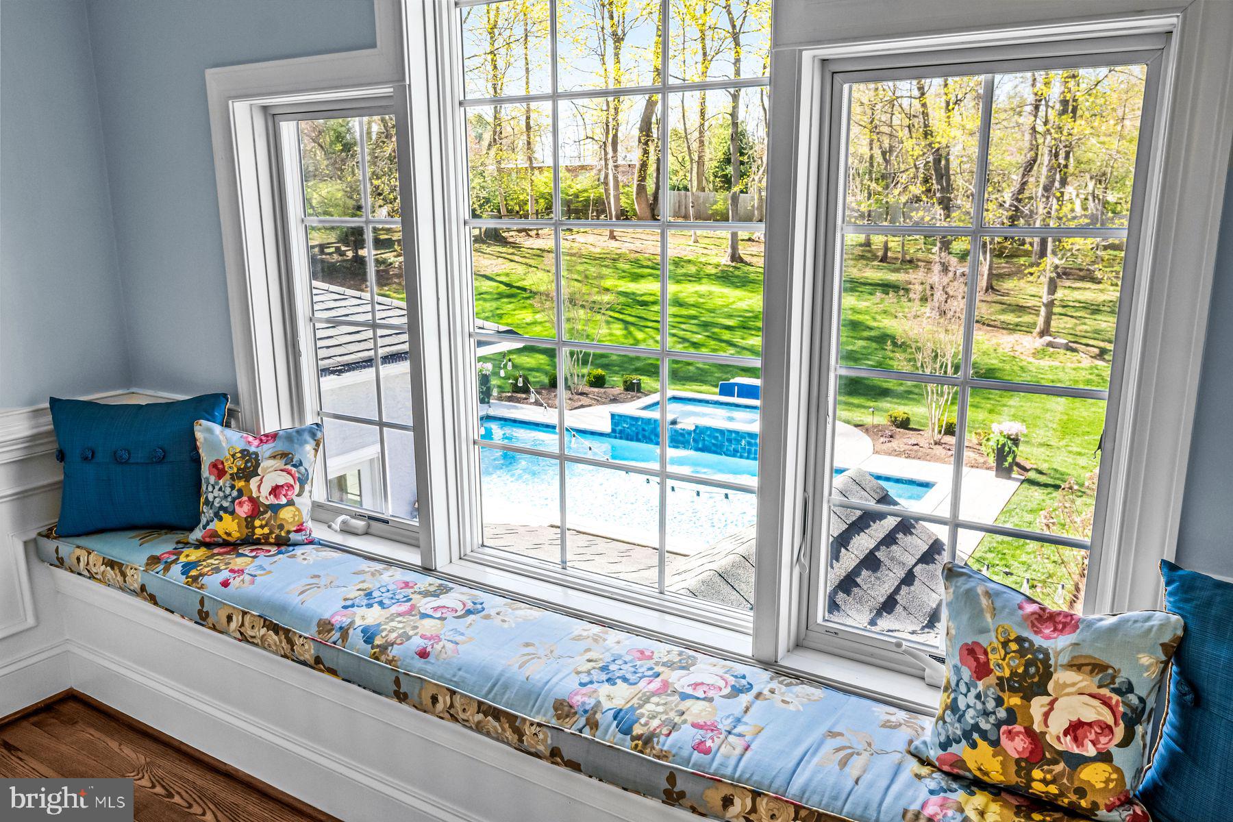 321 Exeter Road Devon, PA 19333 - Photo 41 of 79 a living room filled with furniture and a floor to ceiling window