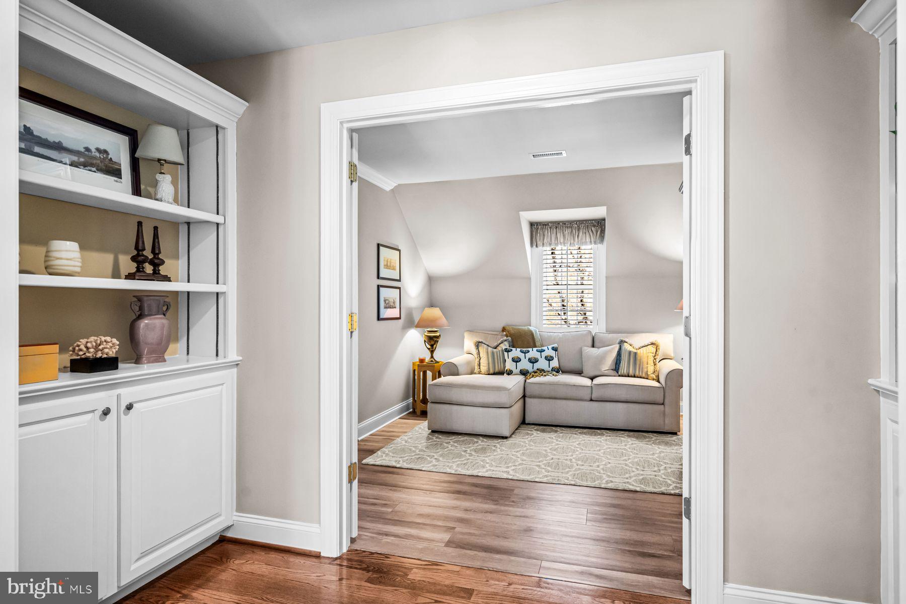 321 Exeter Road Devon, PA 19333 - Photo 43 of 79 a living room with furniture and a wooden floor