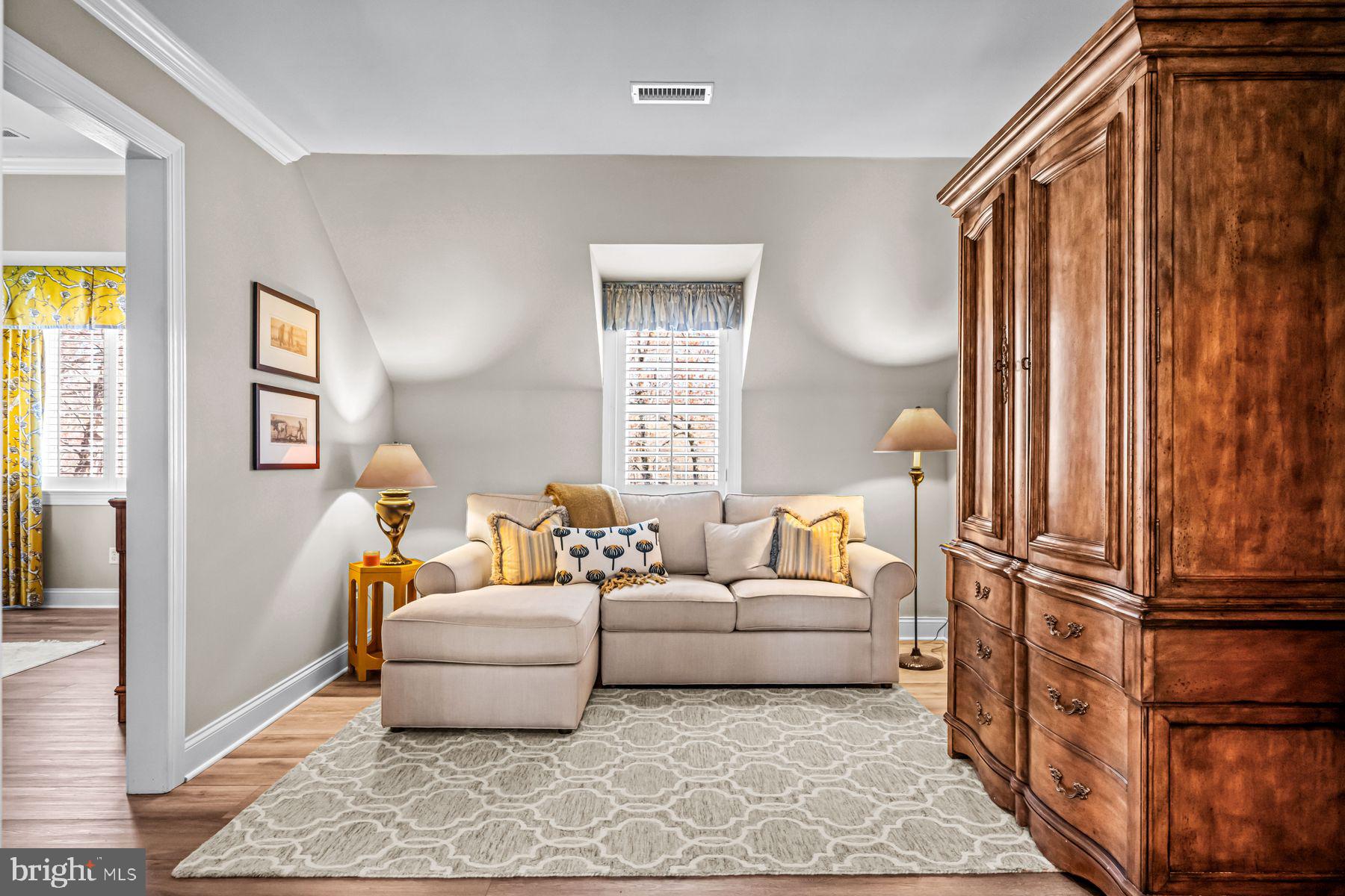 321 Exeter Road Devon, PA 19333 - Photo 44 of 79 a living room with furniture and a window
