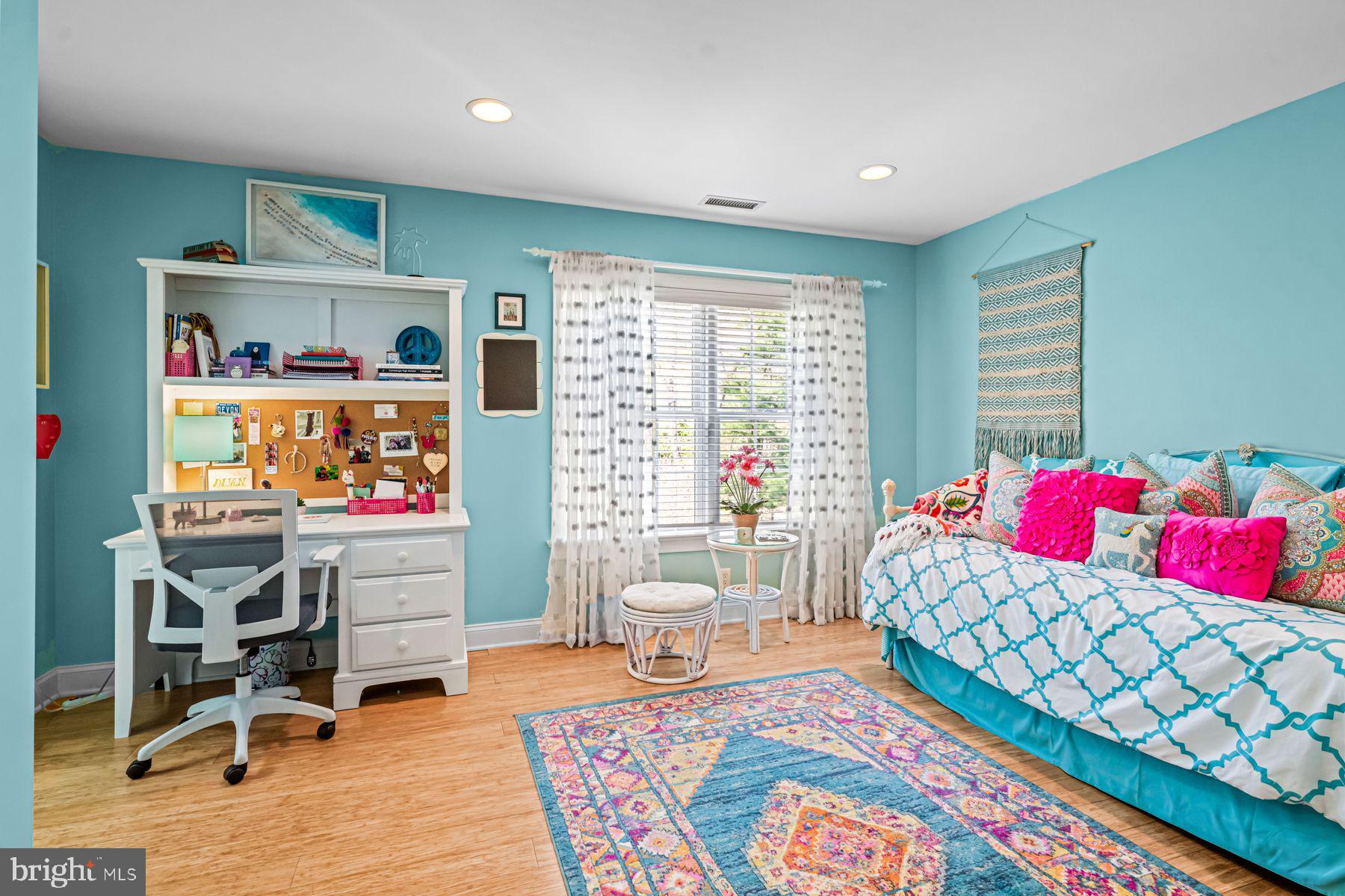 321 Exeter Road Devon, PA 19333 - Photo 55 of 79 a living room with furniture and a flat screen tv