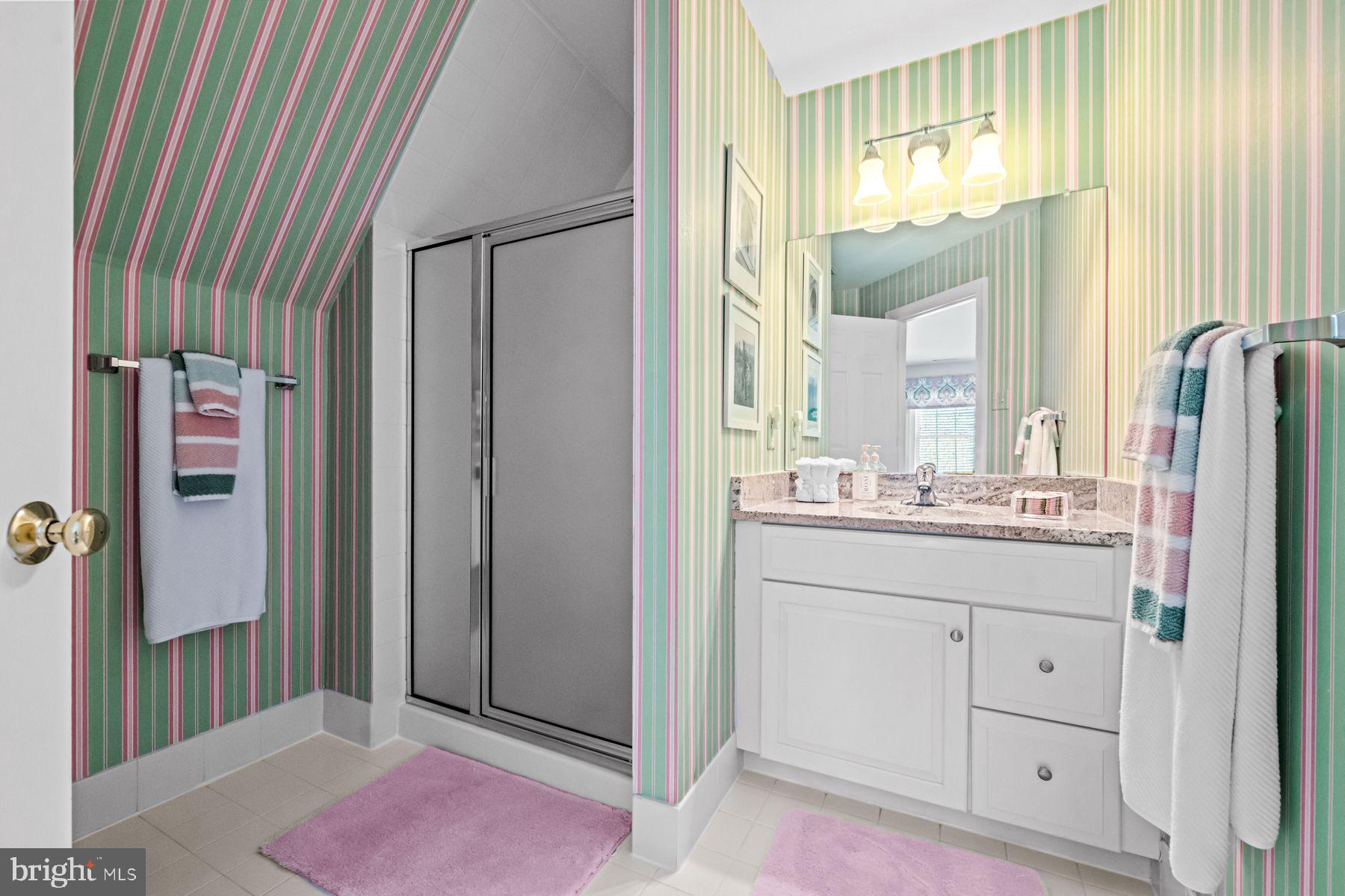 321 Exeter Road Devon, PA 19333 - Photo 61 of 79 a bathroom with a sink and a mirror