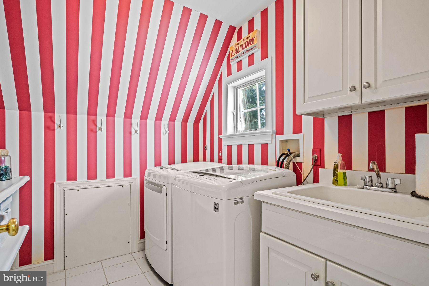 321 Exeter Road Devon, PA 19333 - Photo 62 of 79 a utility room with dryer and washer