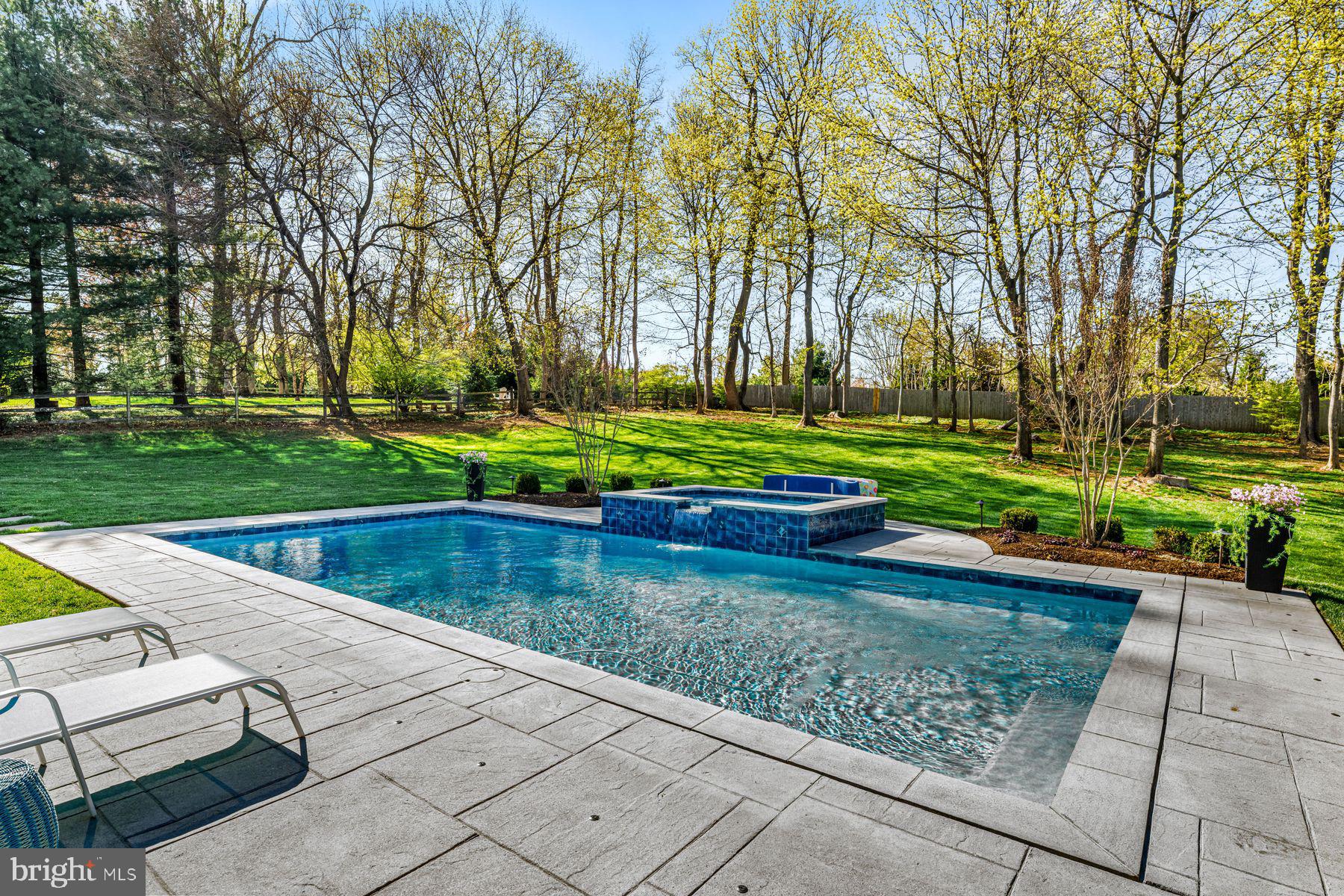 321 Exeter Road Devon, PA 19333 - Photo 77 of 79 a view of backyard with swimming pool and green space