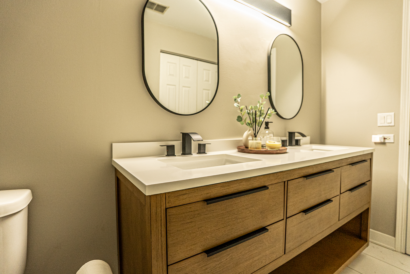 383 Woodview Circle, Unit C Elgin, IL 60120 - Photo 13 of 20 a bathroom with a sink and a mirror