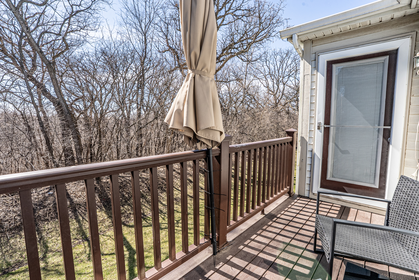 383 Woodview Circle, Unit C Elgin, IL 60120 - Photo 19 of 20 a view of a balcony with wooden floor