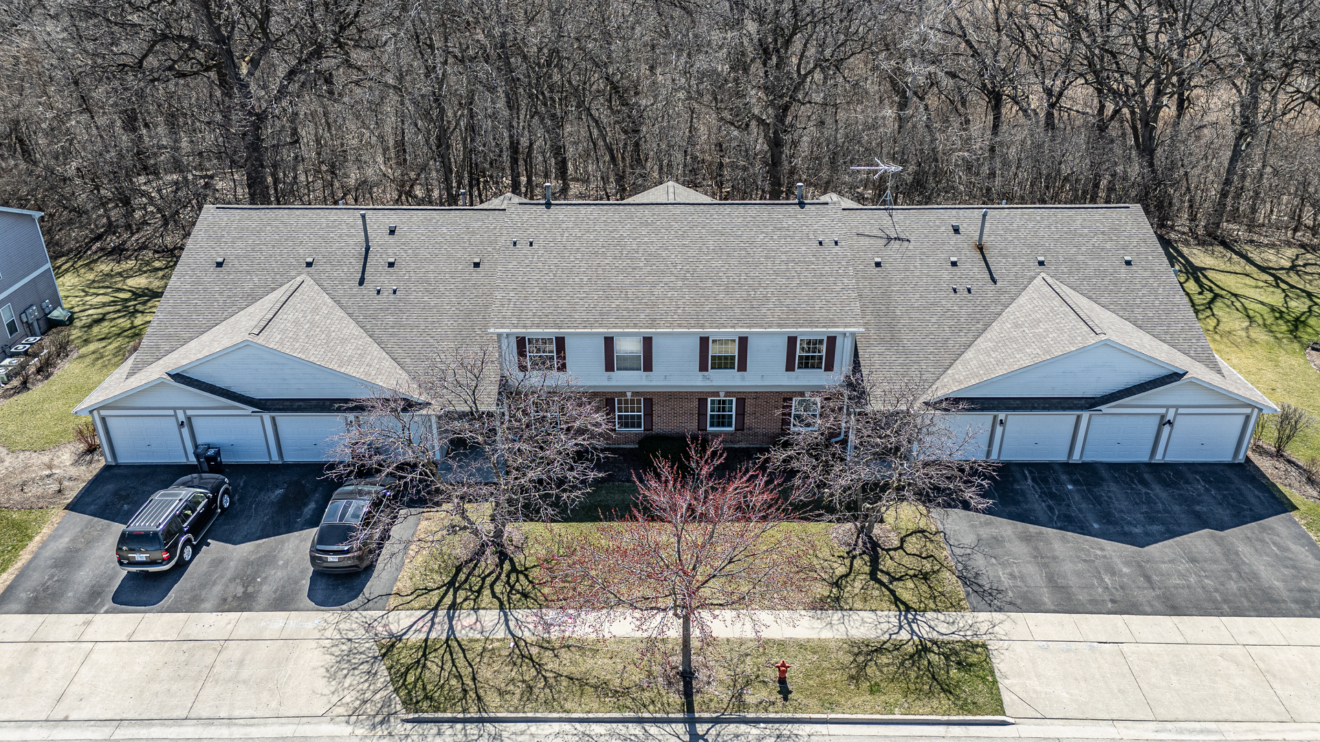 383 Woodview Circle, Unit C Elgin, IL 60120 - Photo 3 of 20 a view of house with a yard and sitting area