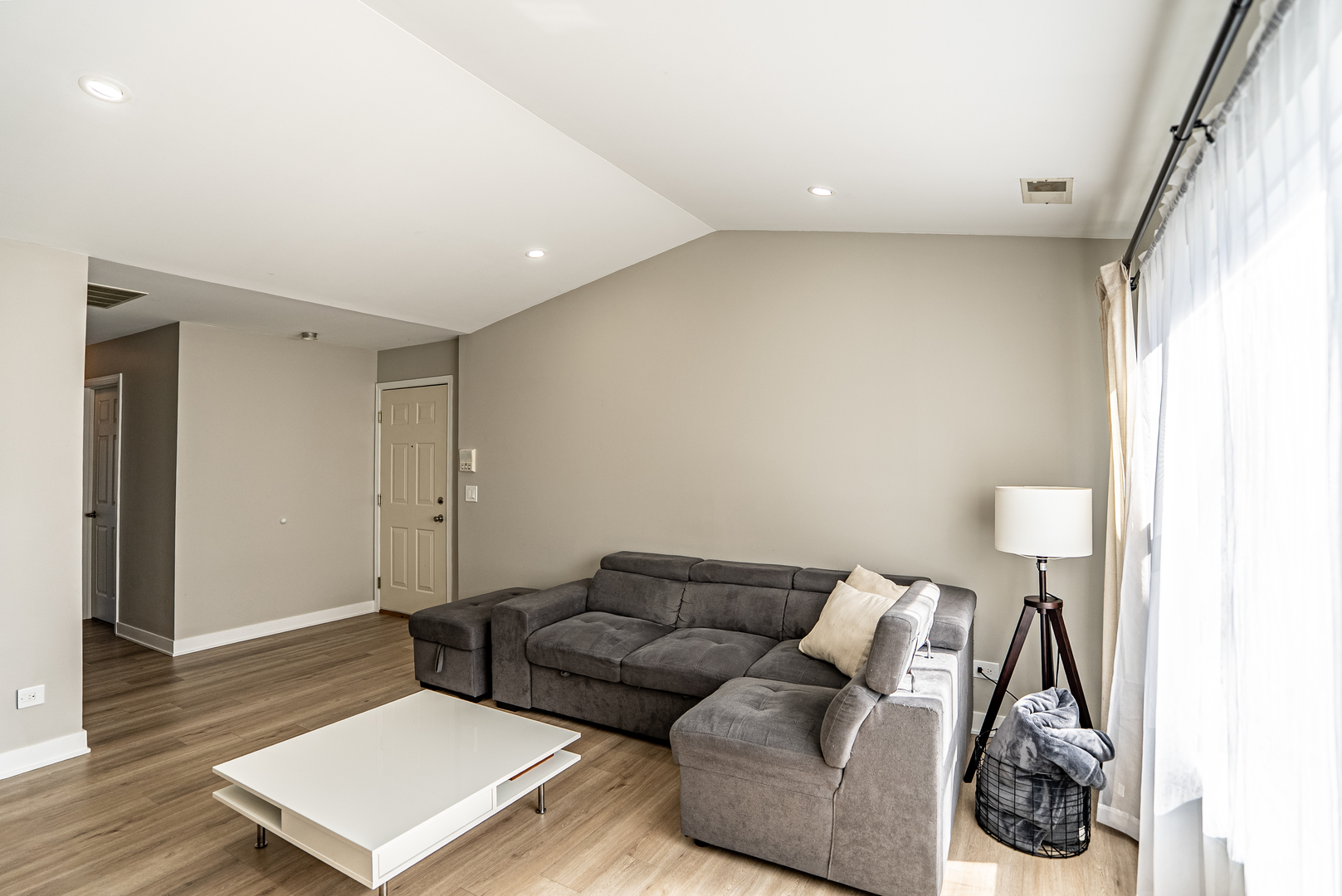 383 Woodview Circle, Unit C Elgin, IL 60120 - Photo 5 of 20 a living room with furniture and a wooden floor