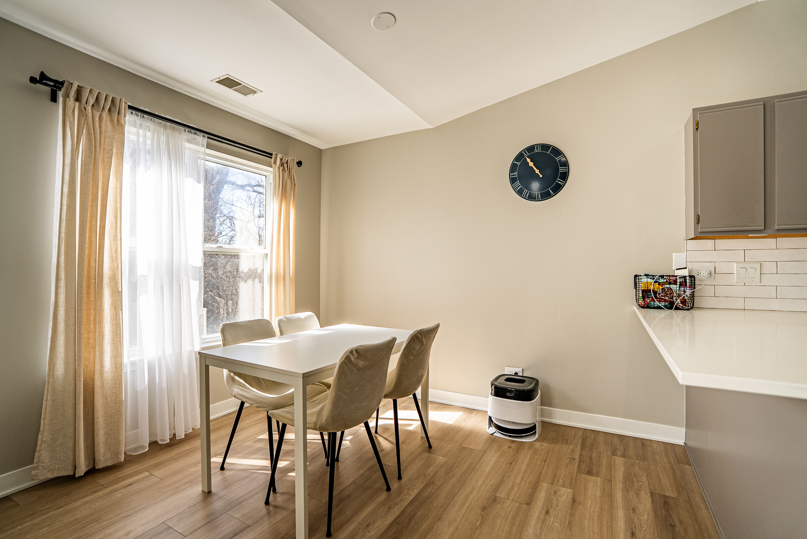 383 Woodview Circle, Unit C Elgin, IL 60120 - Photo 8 of 20 a view of a dining room with furniture window and wooden floor