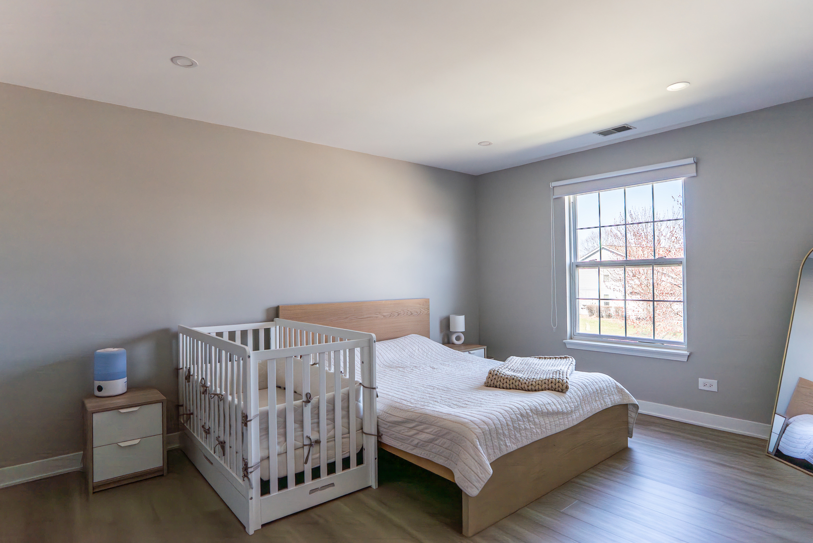 383 Woodview Circle, Unit C Elgin, IL 60120 - Photo 10 of 20 a bedroom with a bed and a window