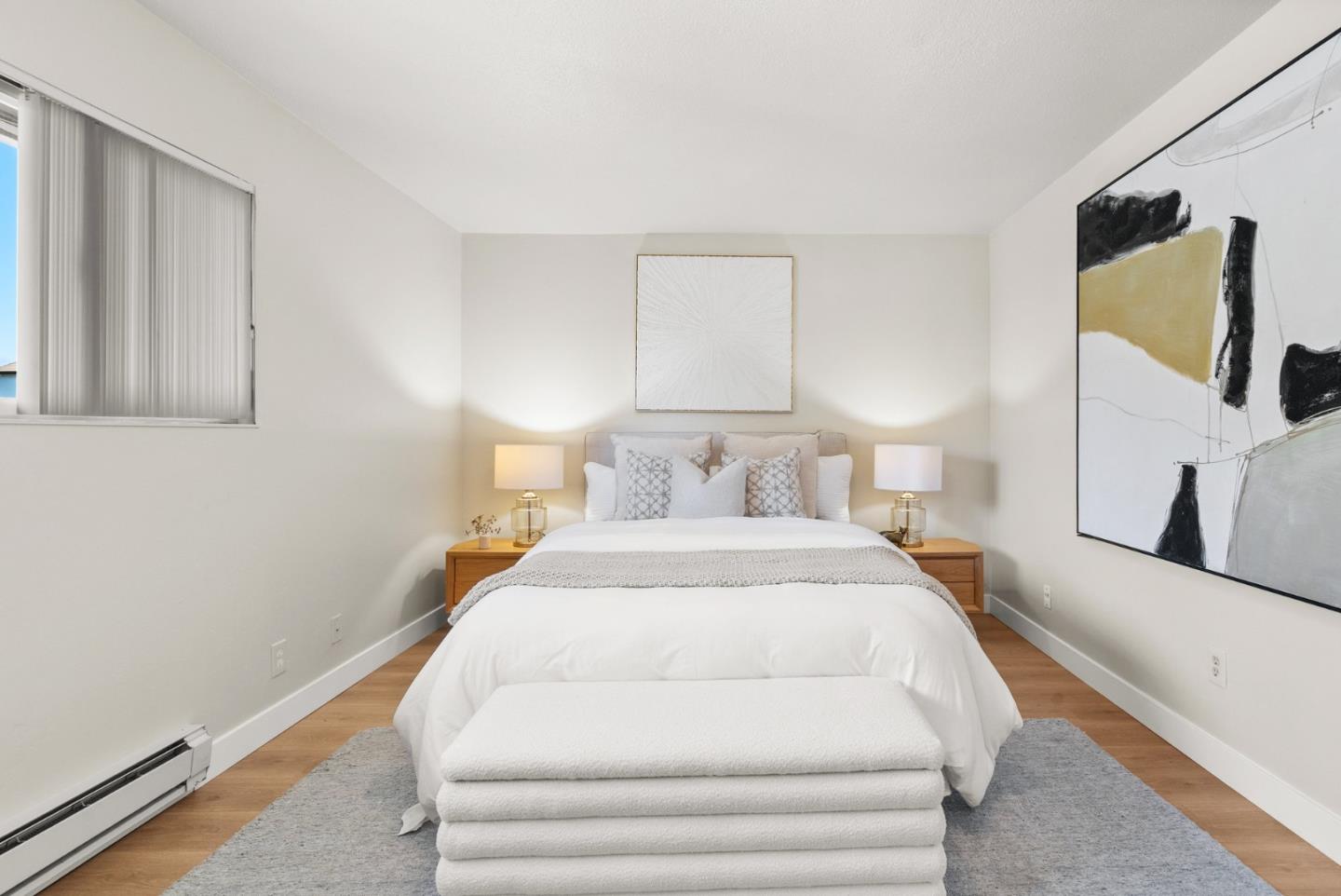 1131 Reed Avenue, Unit D Sunnyvale, CA 94086 - Photo 21 of 32 a spacious bedroom with a bed and window