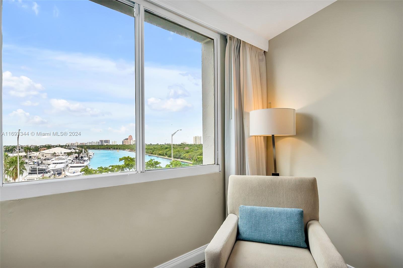 2670 East Sunrise Boulevard, Unit 528 Fort Lauderdale, FL 33304 - Photo 14 of 37 a living room with furniture and a large window