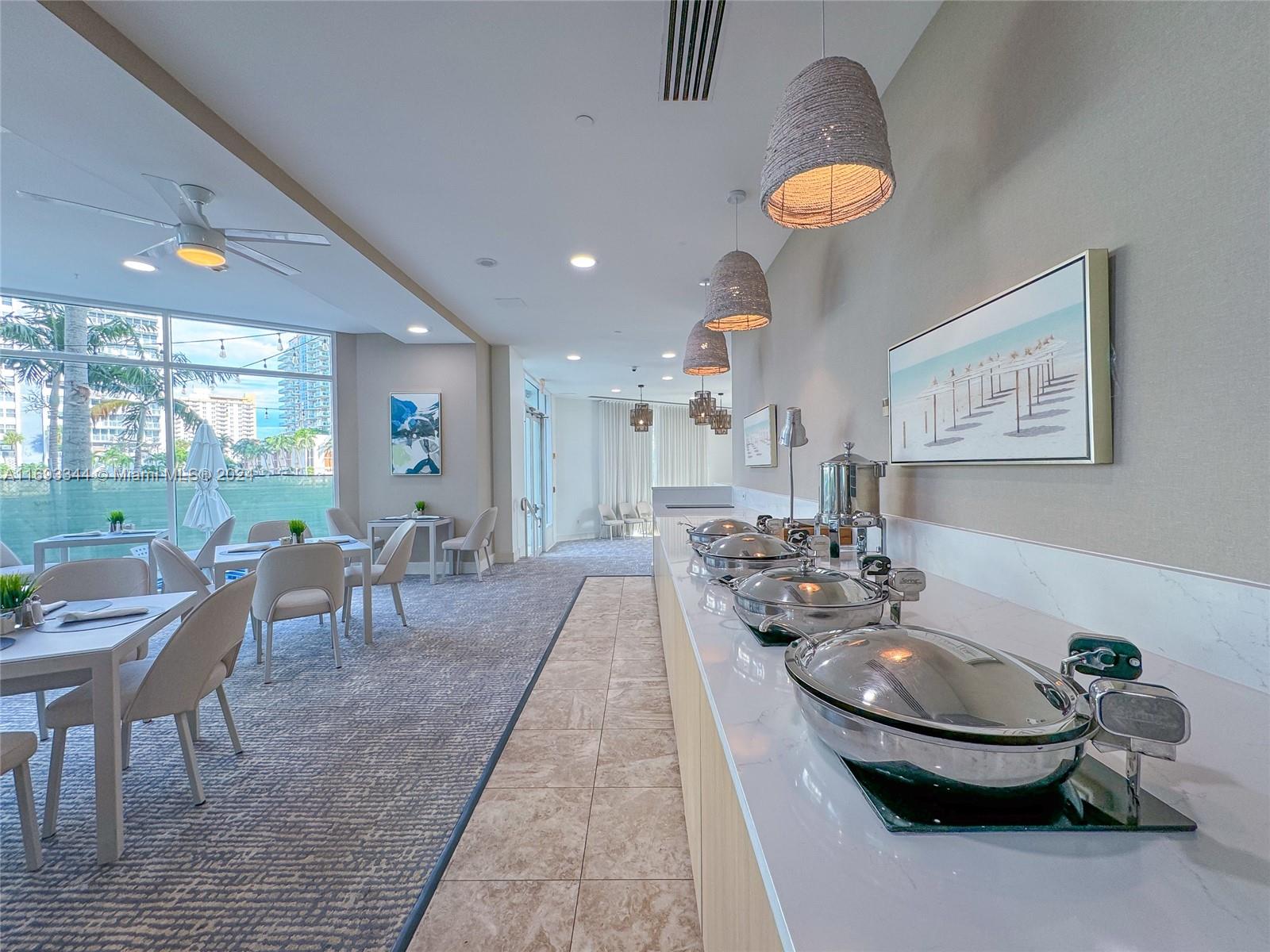 2670 East Sunrise Boulevard, Unit 528 Fort Lauderdale, FL 33304 - Photo 27 of 37 a view of a dining room with furniture and window