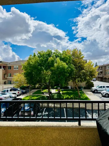 a view of a lake from a balcony