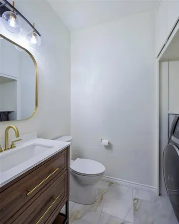 a view of a bathroom with shower