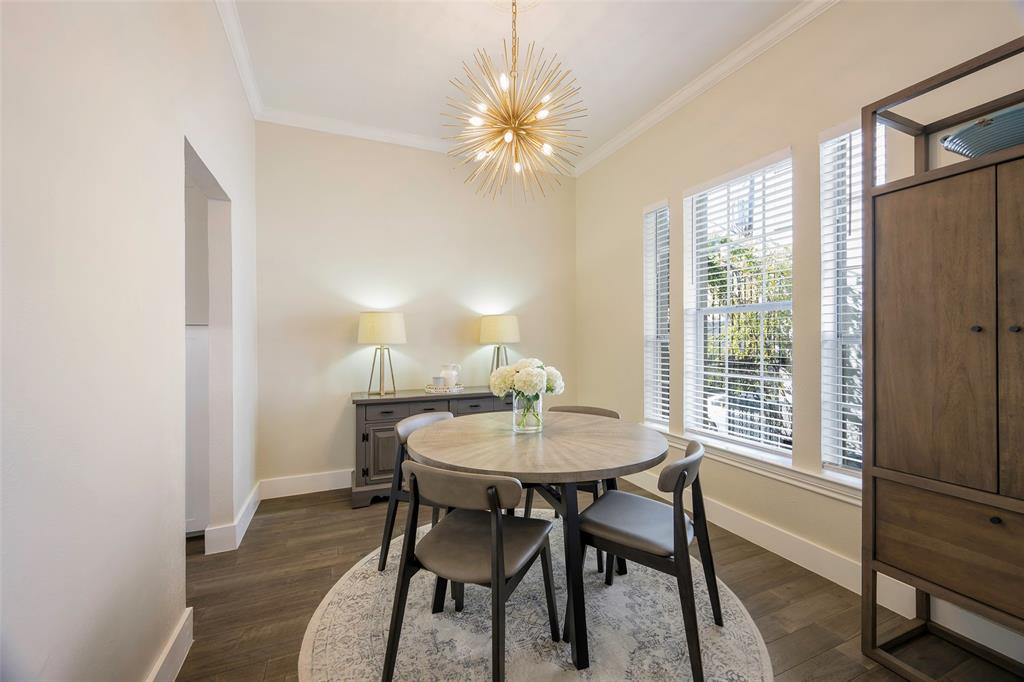 3605 Brown Street, Unit 106 Dallas, TX 75219 - Photo 2 of 19 a dining room with furniture and window