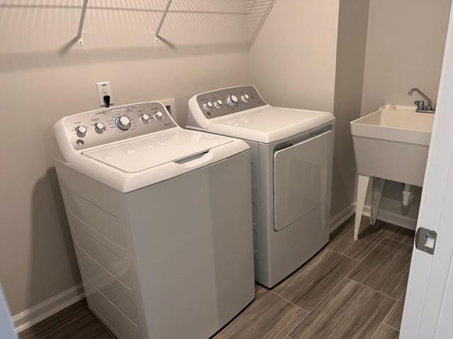 2610 Chert Lane Raleigh, NC 27610 - Photo 17 of 32 a utility room with dryer and washer