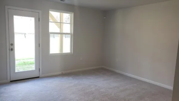 an empty room with windows