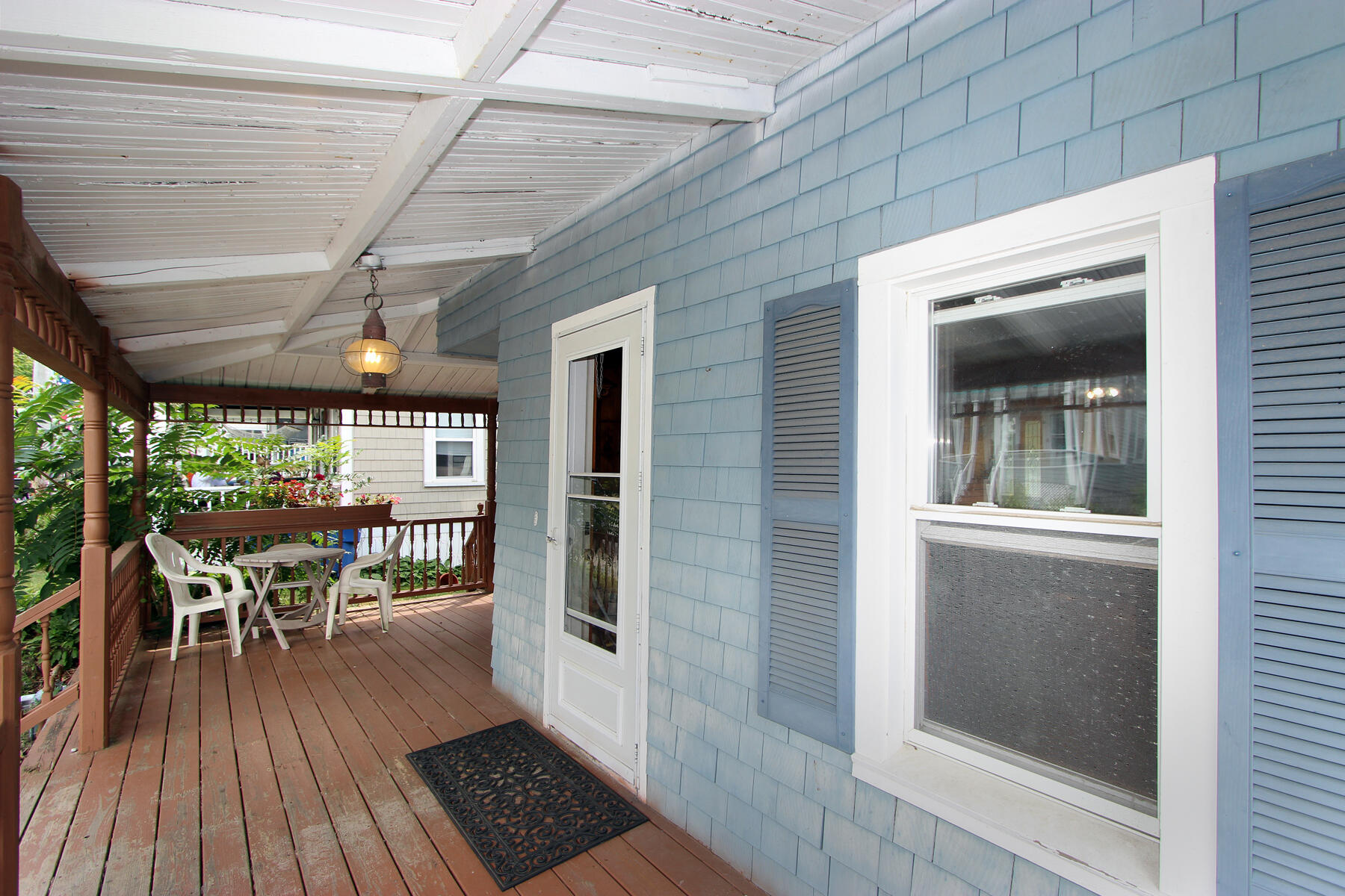 5 Admirals Way Buzzards Bay, MA 02532 - Photo 22 of 28 a view of a patio with table and chairs with wooden floor