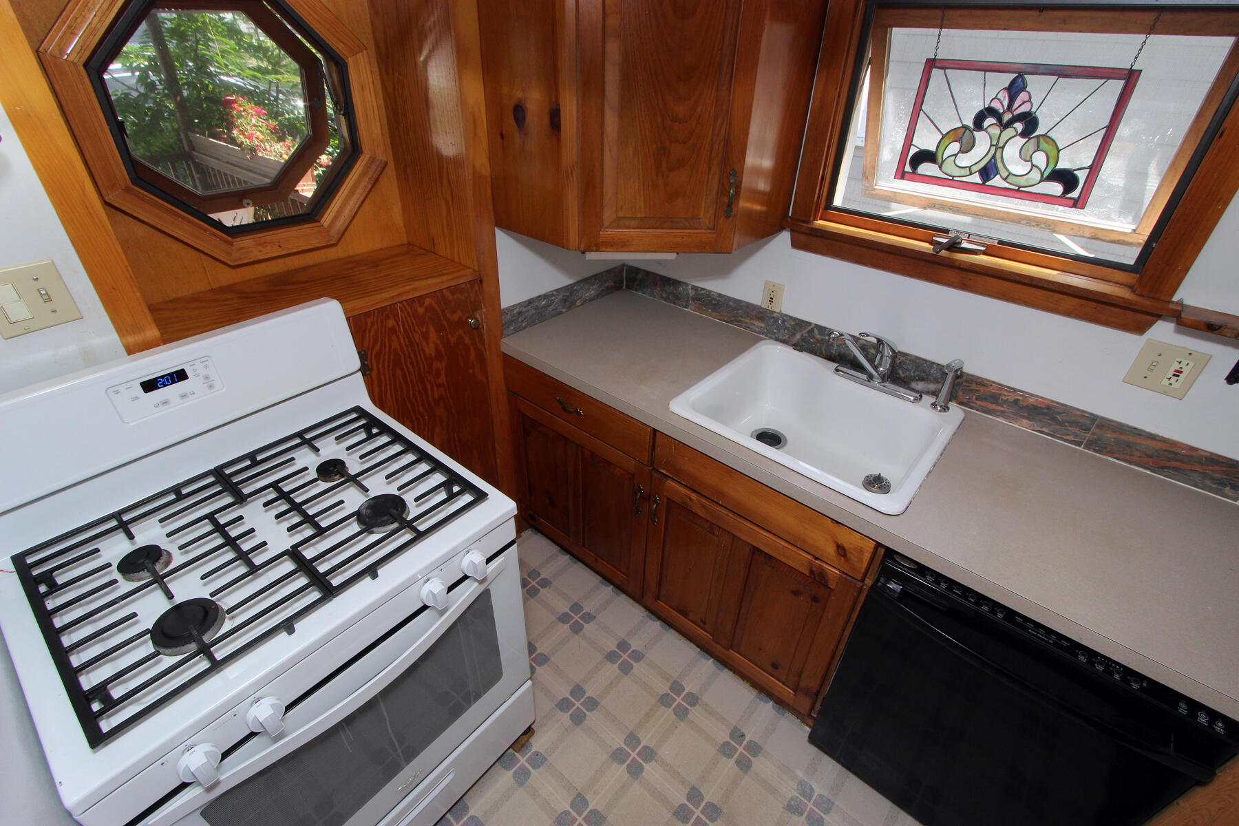 5 Admirals Way Buzzards Bay, MA 02532 - Photo 6 of 28 a stove top oven sitting inside of a kitchen
