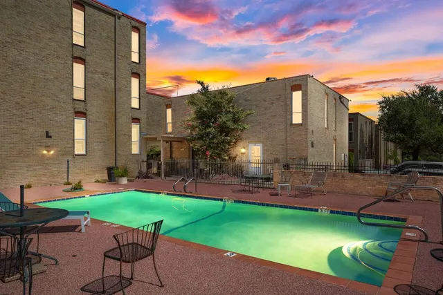 a view of a chairs in backyard of the house
