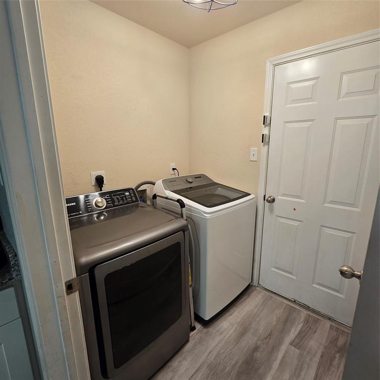 212 Druse Lane Jarrell, TX 76537 - Photo 12 of 38 a utility room with dryer and washer