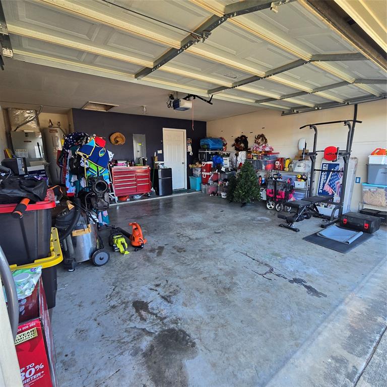 212 Druse Lane Jarrell, TX 76537 - Photo 15 of 38 a view of a storage room with a lot of stuff
