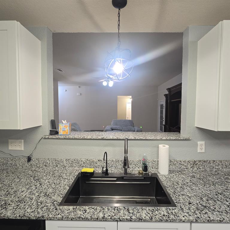 212 Druse Lane Jarrell, TX 76537 - Photo 22 of 38 a bathroom with a sink and a mirror