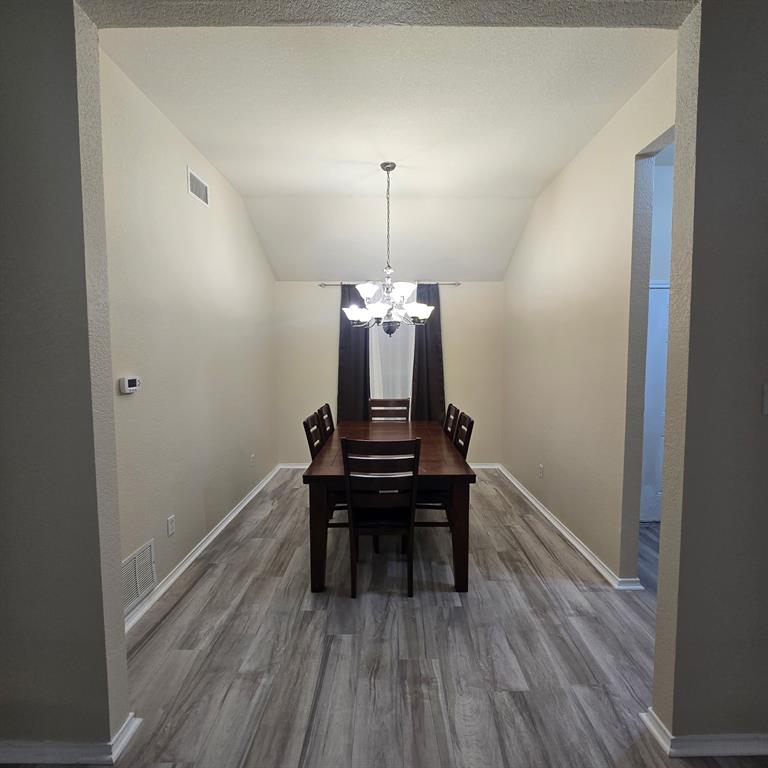 212 Druse Lane Jarrell, TX 76537 - Photo 29 of 38 a room that has a table and chairs in it