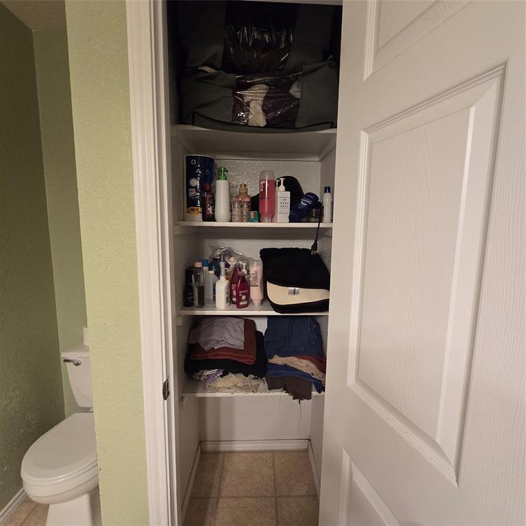 212 Druse Lane Jarrell, TX 76537 - Photo 3 of 38 a room with a wooden floor and a stool